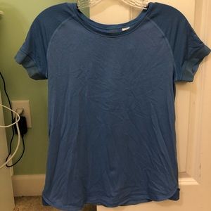 Soft short sleeve Ivivva shirt with mesh details.